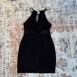 Black bodycon dress with some cutouts